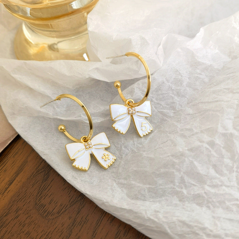 white-pin-earrings-jlt11072