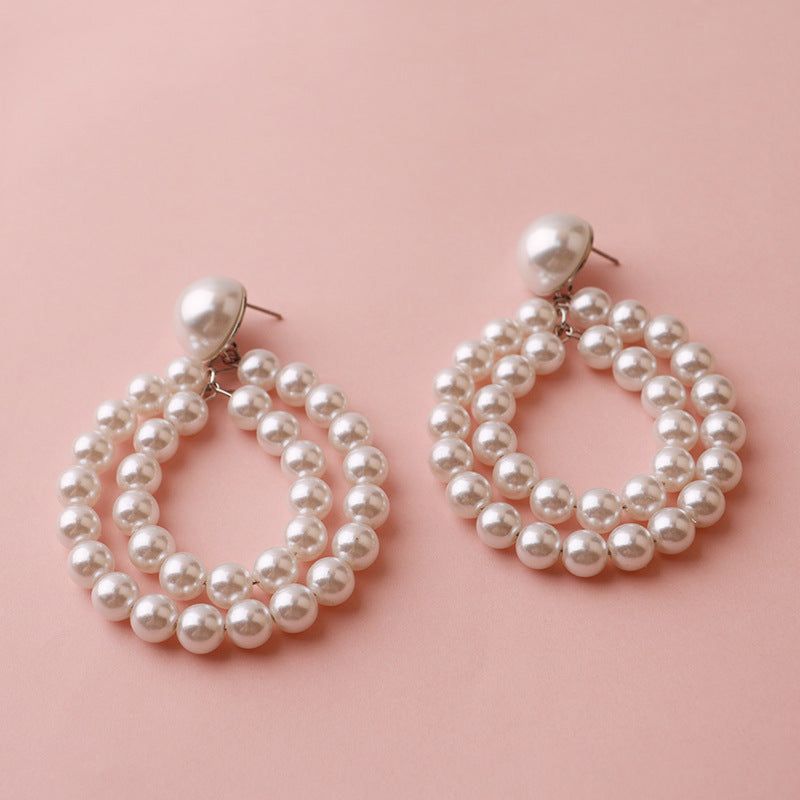 white-pin-earrings-jlt11314
