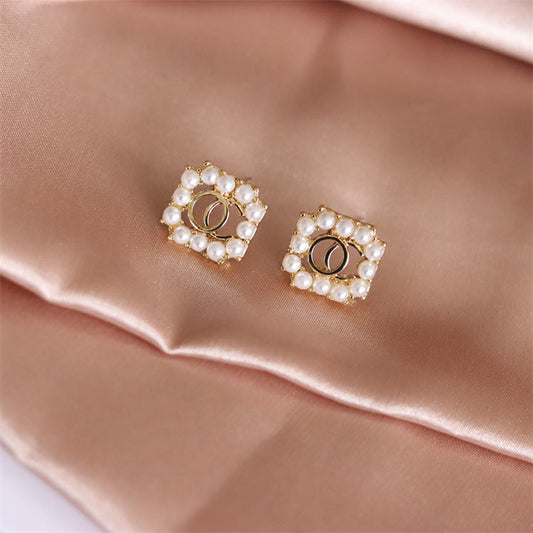 white-pin-earrings-jlt11382