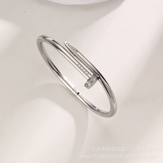 0382-Artificial-Minimalist Nail-Style Silver Bracelet with Sparkling Cubic Zirconia Detailing